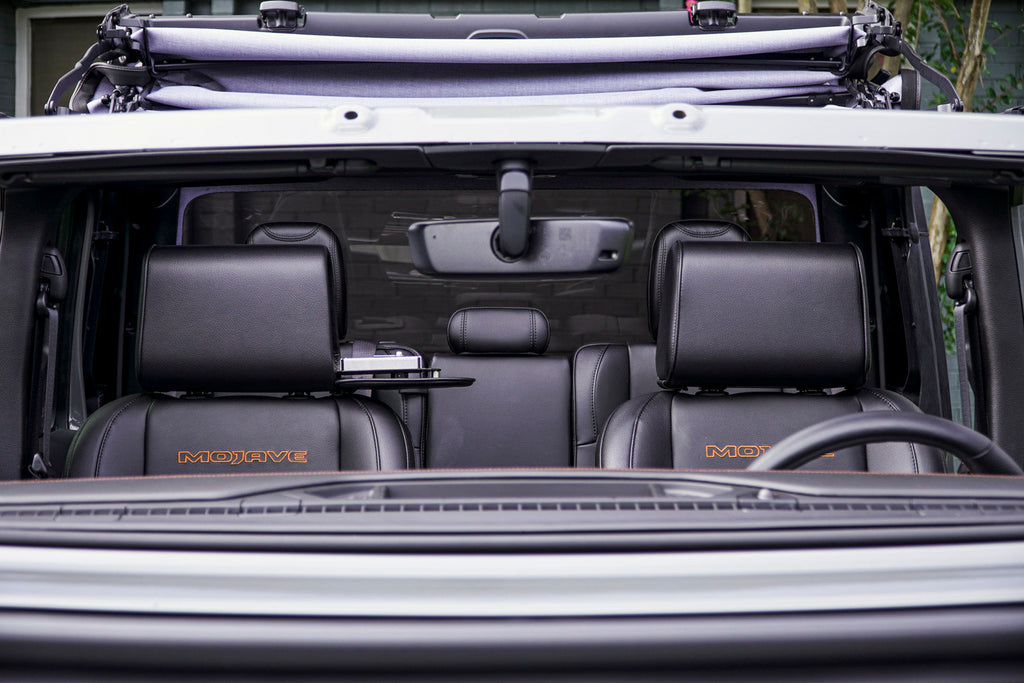 Front view of car with The Vulcan Headrest Safe installed in driver & passenger headrests